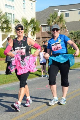 Jane and me having fun along the Myrtle Beach Diva Half Marathon course in 2014